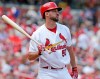 FILE - In this Sunday Aug. 7, 2016 file photo, St. Louis Cardinals' Adam Wainwright (50) bats in a baseball game against the Atlanta Braves in St. Louis. Under new rules for this abbreviated baseball season delayed by the coronavirus, all games will include the designated hitter -- so National League pitchers will no longer have a chance to hit.(AP Photo/Tom Gannam, File)