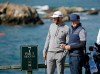 FILE - In this Saturday, Feb. 9, 2019, file photo, Dustin Johnson, left, and Wayne Gretzky stand on the seventh tee of the Pebble Beach Golf Links during the third round of the AT&T Pebble Beach Pro-Am golf tournament, in Pebble Beach, Calif. The Feb. 11-14 tournament will not have celebrities for the first time because of the COVID-19 pandemic. (AP Photo/Eric Risberg, File)