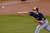 FILE - Milwaukee Brewers relief pitcher Justin Topa throws to the Los Angeles Dodgers during Game 1 of a National League wild-card baseball series Wednesday, Sept. 30, 2020, in Los Angeles. Topa will open the season on the injured list after undergoing an MRI on his elbow. Brewers manager Craig Counsell made that announcement Sunday, March 28, 2021. (AP Photo/Ashley Landis, file)