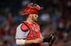FILE - In this Sept. 25, 2019 file photo St. Louis Cardinals catcher Matt Wieters pauses behind home plate during the first inning of a baseball game against the Arizona Diamondbacks in Phoenix. The Cardinals signed Wieters to a contract for the 2020 season on Wednesday, Jan. 22, 2020 bringing back the 33-year-old veteran to fill the same role behind Yadier Molina as last season. (AP Photo/Ross D. Franklin, file)