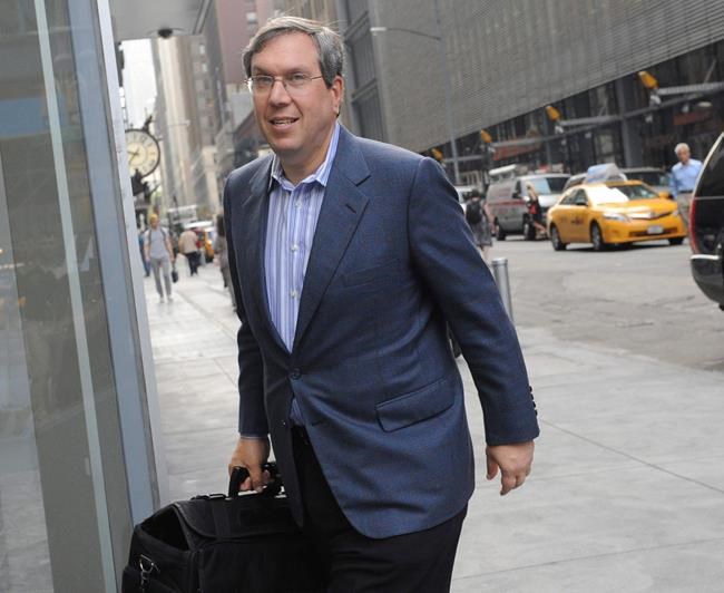 FILE- In this July 8, 2011, file photo, attorney Jeffrey Kessler enters a Manhattan law office in New York. Several people familiar with the conversations tell The Associated Press that the baseball players' association has discussed hiring the noted sports lawyer to litigate a contemplated grievance. In divisive talks reminiscent of baseball’s eight work stoppages from 1972-95, the sides failed to reach an economic agreement last month. (AP Photo/Louis Lanzano, File)