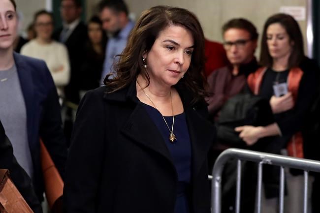 FILE - In this Jan. 23, 2020 file photo, actress Annabella Sciorra returns after a lunch break in Harvey Weinstein's rape trial in New York. More than a year after Weinstein's rape conviction, his lawyers are demanding a new trial, arguing in court papers Monday, April 5, 2021, that the landmark #MeToo prosecution that put him behind bars was buoyed by improper rulings from a judge who was
