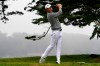 FILE - In this Sunday, Aug. 9, 2020, file photo, Collin Morikawa watches his tee shot on the 16th hole during the final round of the PGA Championship golf tournament at TPC Harding Park in San Francisco. His drive to 7 feet for eagle was the defining moment of his first major title. (AP Photo/Jeff Chiu, File)