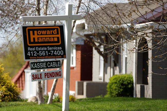 FILE - This Monday, April 27, 2020, file photo shows a sale pending sign on a home in Mount Lebanon, Pa. The coronavirus pandemic helped shape the housing market by influencing everything from the direction of mortgage rates to the inventory of homes on the market to the types of homes in demand and the desired locations. (AP Photo/Gene J. Puskar, File)