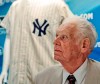 FILE - In this June 28, 2012, file photo, New York Yankees great Don Larsen reacts during a news conference announcing the auction of his 1956 perfect game uniform, in New York. Larsen, the journeyman pitcher who reached the heights of baseball glory in 1956 for the New York Yankees when he threw a perfect game and only no-hitter in World Series history, died Wednesday, Jan. 1, 2020. He was 90. (AP Photo/Bebeto Matthews, File)