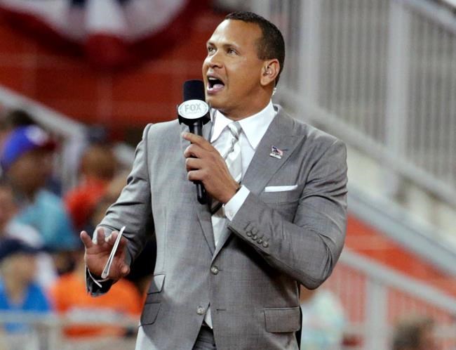 FILE - In this July 11, 2017, file photo, former Major League Baseball player Alex Rodriguez reports from the field during the MLB baseball All-Star Game in Miami. Rodriguez, among four groups of bidders for a possible purchase of the New York Mets, called for baseball players to accept the type of revenue-sharing system that is tied to a salary cap and sparked quick opposition from the union. (AP Photo/Lynne Sladky, File)