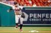 File-This July 30, 2019, file photo shows Atlanta Braves shortstop Johan Camargo throwing out Washington Nationals' Howie Kendrick at first base on his ground ball during the eighth inning of a baseball game in Washington. Camargo sees an open path to a second chance to be the Atlanta Braves' starting third baseman. After hard lessons in a demotion to the minors last season, Camargo has renewed motivation to make the most of this second opportunity. (AP Photo/Patrick Semansky, File)