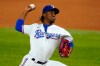 File-This Sept. 9, 2020, file photo shows Texas Rangers relief pitcher Rafael Montero throwing to the Los Angeles Angels in a baseball game in Arlington, Texas. The Seattle Mariners bolstered their bullpen on Tuesday by acquiring right-handed reliever Montero from the Rangers. (AP Photo/Tony Gutierrez, File)