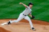 In his first regular season appearance, New York Yankees starting pitcher Gerrit Cole (45) delivers during the first inning of a baseball game against the Philadelphia Phillies, Monday, Aug. 3, 2020, at Yankee Stadium in New York. (AP Photo/Kathy Willens)