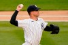New York Yankees starting pitcher Corey Kluber throws to an Atlanta Braves batter during the first inning of a baseball game Wednesday, April 21, 2021, at Yankee Stadium in New York. (AP Photo/Kathy Willens)