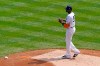 New York Yankees starting pitcher Domingo German reacts during the second inning of a baseball game against the Toronto Blue Jays, Sunday, April 4, 2021, at Yankee Stadium in New York. German gave up a solo home run and a two-run blast to Blue Jays hitters. (AP Photo/Kathy Willens)
