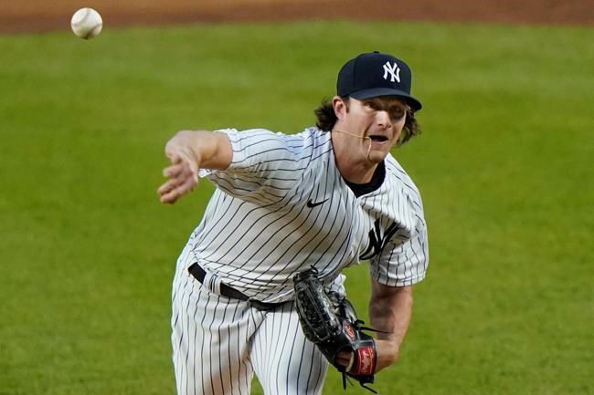 New York Yankees starting pitcher Gerrit Cole delivers during the first inning of a baseball game against the Tampa Bay Rays, Monday, Aug. 31, 2020, at Yankee Stadium in New York. (AP Photo/Kathy Willens)