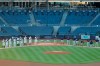 The New York Yankees, left, and the Boston Red Sox line up for the national anthem before the baseball game at Yankee Stadium, Friday, July 31, 2020, in New York. (AP Photo/Seth Wenig)