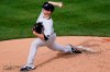 New York Yankees starting pitcher Clarke Schmidt winds up during the third inning of a baseball game against the Miami Marlins, Sunday, Sept. 27, 2020, at Yankee Stadium in New York. (AP Photo/Kathy Willens)