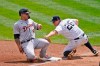 Detroit Tigers' Wilson Ramos, left, slides safely into third past New York Yankees third baseman DJ LeMahieu during the third inning of a baseball game at Yankee Stadium, Sunday, May 2, 2021, in New York. (AP Photo/Seth Wenig)