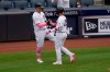 New York Yankees' Gary Sanchez, left, celebrates with Gleyber Torres after Torres hit a home run during the sixth inning of a baseball game against the Washington Nationals at Yankee Stadium, Sunday, May 9, 2021, in New York. (AP Photo/Seth Wenig)