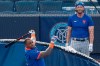New York Mets Jeff McNeil, right, watches Yoenis Cespedes take batting practice before an exhibition game against the New York Yankees, Sunday, July 19, 2020, at Yankee Stadium in New York. (AP Photo/Kathy Willens)
