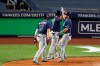 Tampa Bay Rays Brandon Lowe, right, celebrates with Austin Meadows (17) and Michael Perez (7) both of whom scored on Lowe's thrid-inning, three-run home run in a baseball game against the New York Yankees, Tuesday, Aug. 18, 2020, in New York. (AP Photo/Kathy Willens)
