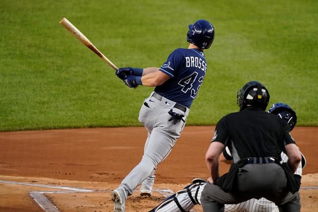 Tampa Bay Rays Michael Brosseau follows through on a two-run, home run in the first inning of a baseball game against the New York Yankees, Wednesday, Sept. 2, 2020, at Yankee Stadium in New York. (AP Photo/Kathy Willens)