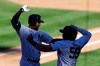 New York Yankees' Aaron Hicks celebrates with Luke Voit (59) after hitting a two-run home run against the New York Mets during the seventh inning of the first baseball game of a doubleheader, Sunday, Aug. 30, 2020, in New York. (AP Photo/Adam Hunger)