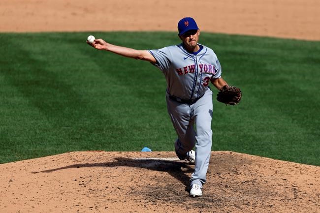 New York Mets pitcher Jared Hughes delivers a pitch against the New York Yankees during the seventh inning of the first baseball game of a doubleheader, Sunday, Aug. 30, 2020, in New York. The Yankees won 8-7. (AP Photo/Adam Hunger)
