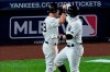 New York Yankees' Mike Tauchman, left, celebrates with Clint Frazier, right, after Frazier hit a three-run home run during the sixth inning of a baseball game against the Boston Red Sox Saturday, Aug. 15, 2020, in New York. (AP Photo/Frank Franklin II)