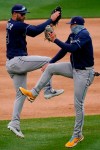 Tampa Bay Rays' Kevin Kiermaier, left, celebrates with teammate Willy Adames, right, after a baseball game against the New York Yankees Saturday, April 17, 2021, in New York. The Rays won 6-3. (AP Photo/Frank Franklin II)