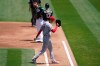 Los Angeles Angels' Shohei Ohtani (17) walks toward the dugout after being relieved during the first inning of a baseball game against the Oakland Athletics in Oakland, Calif., Sunday, July 26, 2020. Athletics' Robbie Grossman, top left, hit an RBI-single. (AP Photo/Jeff Chiu)