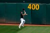 Oakland Athletics center fielder Ramon Laureano catches a ball hit by San Francisco Giants' Brandon Belt for an out during the first inning of a baseball game in Oakland, Calif., Sunday, Sept. 20, 2020. (AP Photo/Jeff Chiu)