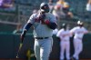 Minnesota Twins' Miguel Sano walks to the dugout after striking out against the Oakland Athletics during the fourth inning of the first baseball game of a doubleheader in Oakland, Calif., Tuesday, April 20, 2021. (AP Photo/Jeff Chiu)