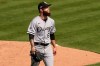 Chicago White Sox pitcher Dallas Keuchel walks to the dugout after retiring the Oakland Athletics during the first inning of Game 2 of an American League wild-card baseball series Wednesday, Sept. 30, 2020, in Oakland, Calif. (AP Photo/Eric Risberg)