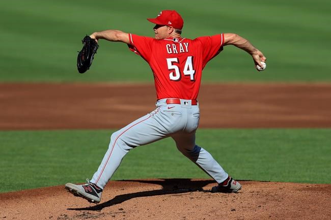 Cincinnati Reds' Sonny Gray throws during an intrasquad game at the baseball team's practice in Cincinnati, Tuesday, July 14, 2020. (AP Photo/Aaron Doster)