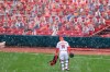 Cincinnati Reds' Tucker Barnhart walks to the bullpen as snow falls prior to the continuation of a baseball game against the Arizona Diamondbacks in Cincinnati, Wednesday, April 21, 2021. The game was suspended in the eighth inning the day before due to rain. (AP Photo/Aaron Doster)