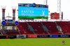 A view of the video board in celebration of Easter prior to a baseball game between the St. Louis Cardinals and the Cincinnati Reds in Cincinnati, Sunday, April 4, 2021. (AP Photo/Aaron Doster)
