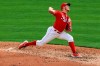 Cincinnati Reds' Trevor Bauer throws in the fourth inning during a baseball game against the Pittsburgh Pirates in Cincinnati, Monday, Sept. 14, 2020. (AP Photo/Aaron Doster)