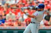 New York Mets' Dominic Smith hits a single during the fourth inning of a baseball game against the Cincinnati Reds in Cincinnati, Wednesday, July 21, 2021. (AP Photo/Aaron Doster)
