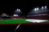 A trap covers the infield during a rain delay in the eighth inning of a baseball game between the Arizona Diamondbacks and the Cincinnati Reds in Cincinnati, Tuesday, April 20, 2021. (AP Photo/Aaron Doster)