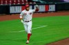 Cincinnati Reds' Joey Votto (19) points to the grounds crew after hitting a two-run home run in the sixth inning during a baseball game against the Cleveland Indians in Cincinnati, Monday, August 3, 2020. (AP Photo/Aaron Doster)