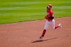 Cincinnati Reds Tyler Naquin (12) runs the base after hitting a home run during the first inning of a baseball game against the Pittsburgh Pirates at Great American Ball Park in Cincinnati, Wednesday, April 7, 2021. (AP Photo/Bryan Woolston)