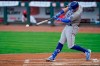 Kansas City Royals first baseman Ryan O'Hearn (66) hits a double during the second inning of a baseball game against the Cincinnati Reds at Great American Ballpark in Cincinnati, Tuesday, August 11, 2020. (AP Photo/Bryan Woolston)