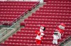 Cincinnati Reds mascots cheer from the outfield during a baseball game against the Pittsburgh Pirates at Great American Ballpark in Cincinnati, Thursday, Aug. 13, 2020. (AP Photo/Bryan Woolston)