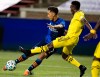FC Cincinnati forward Yuya Kubo (7) shoots on goal as Columbus Crew defender Harrison Afful (25) deflects the shot in the first half of an MLS soccer match Wednesday, Oct. 14, 2020, in Cincinnati. (Albert Cesare/The Cincinnati Enquirer via AP)