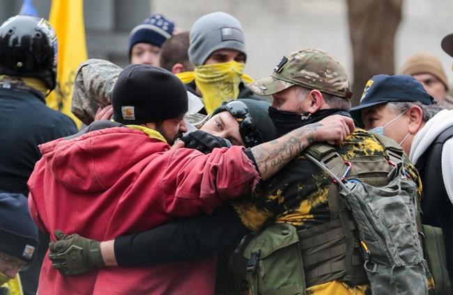 A man is treated following a fight during a