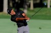 Tiger Woods hits from the 13th fairway during a practice round for the Memorial golf tournament, Tuesday, July 14, 2020, in Dublin, Ohio. (AP Photo/Darron Cummings)