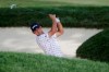 Gary Woodland hits from a bunker toward the 18th green during the second round of the Memorial golf tournament, Friday, July 17, 2020, in Dublin, Ohio. (AP Photo/Darron Cummings)