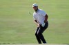Jon Rahm, of Spain, watches his chip to the 18th green during the third round of the Memorial golf tournament, Saturday, July 18, 2020, in Dublin, Ohio. (AP Photo/Darron Cummings)