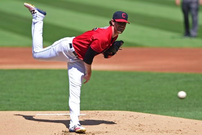 Cleveland Indians starting pitcher Shane Bieber delivers during the first inning of a baseball game against the Milwaukee Brewers, Sunday, Sept. 6, 2020, in Cleveland. (AP Photo/David Dermer)