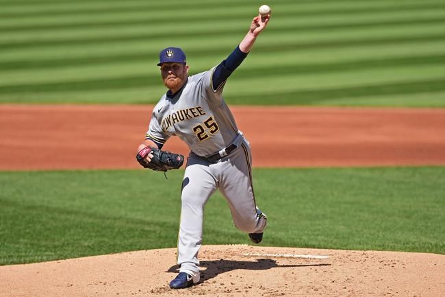 Milwaukee Brewers starting pitcher Brett Anderson delivers during the first inning of a baseball game against the Cleveland Indians, Sunday, Sept. 6, 2020, in Cleveland. (AP Photo/David Dermer)