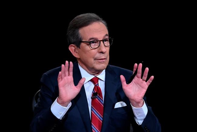 Moderator Chris Wallace of Fox News speaks as President Donald Trump and Democratic presidential candidate former Vice President Joe Biden participate in the first presidential debate Tuesday, Sept. 29, 2020, at Case Western University and Cleveland Clinic, in Cleveland. (Olivier Douliery/Pool vi AP)