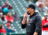 Detroit Tigers manager A.J. Hinch walks back to the dugout after making a pitching change during the eighth inning of a baseball game against the Cleveland Indians in Cleveland, Sunday, April 11, 2021. (AP Photo/Phil Long)
